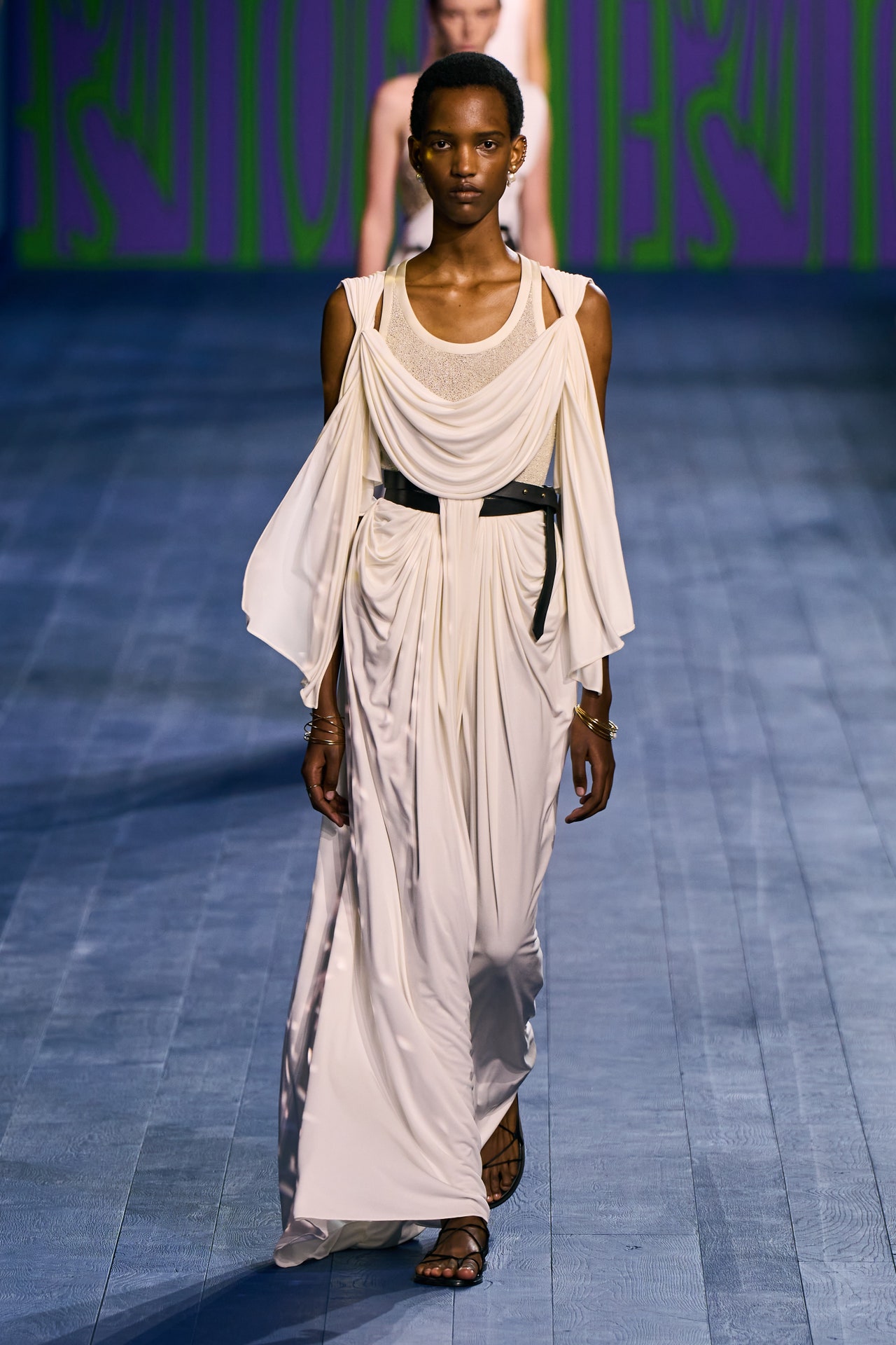 Image may contain Fashion Clothing Footwear Sandal Adult Person Accessories Bracelet Jewelry and Performer