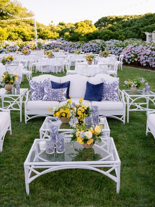 Image may contain Grass Plant Furniture Table Lawn Cup Backyard Nature Outdoors Yard Dining Table and Flower