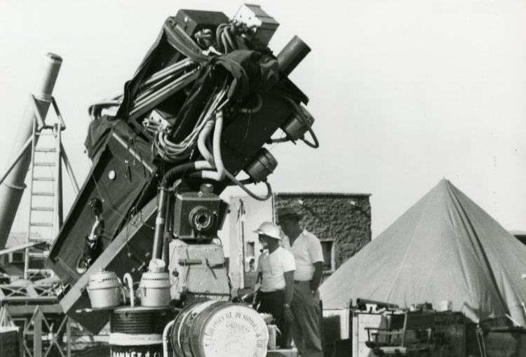 1952: This remarkable eclipse experiment -- the most advanced of its kind at that time -- studied the spectrum of elements present in the solar chromosphere with unprecedented height discrimination and high spectral resolution. The spectra provided the first experimental evidence for the newly developed concept of non-local thermodynamic equilibrium conditions in the solar atmosphere. Results from the experiment formed the basis for numerous publications at HAO and elsewhere in the 1953 - 1960 period and, in fact, provided the impetus for HAO to develop into a broad, research-oriented institution.