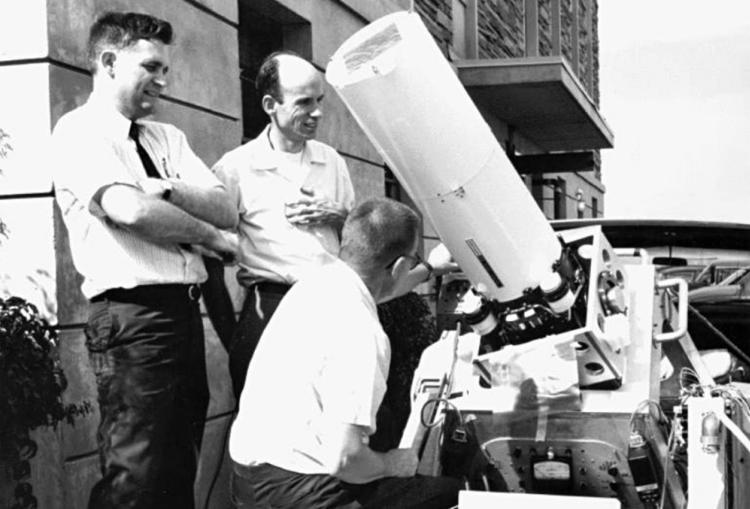 Jack Eddy, John Firor, and Bob Lee prepare the eclipse expedition coronagraph at the HAO Astro-Geophysics Department building on the University of Colorado campus. Two different HAO teams were involved in this eclipse. A coronal camera designed by Gordon Newkirk Jr. made its debut with photometric and polarimetric observations from a site near Pulacayo, Bolivia in 1966.