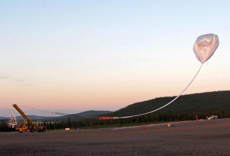 HiWind, led by Principal Investigator Qian Wu, is the first balloon-borne Fabry-Perot interferometer specially conceived to measure the daytime thermospheric winds by monitoring the neutral wind induced Doppler shift in the airglow emission O 630 nm. Shown above is the launch from Kiruna, Sweden in 2011.
