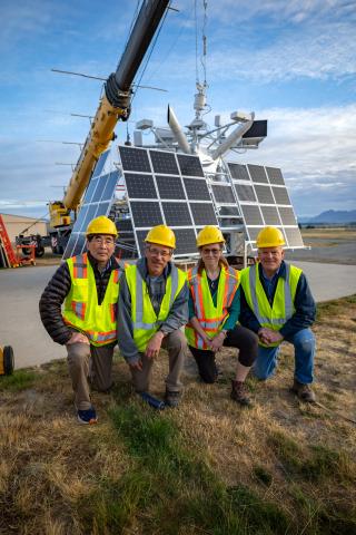 HiWind team posing in front of gondola.