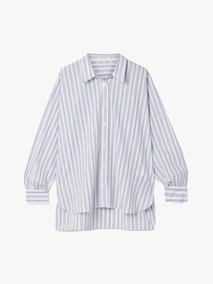 Image may contain Clothing Shirt Blouse Long Sleeve Sleeve and Dress Shirt