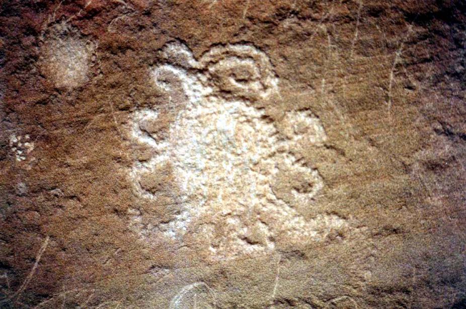 A petroglyph, suggestive of a solar eclipse, is found on the South side of a large boulder near the Una Vida ruin in Chaco Canyon